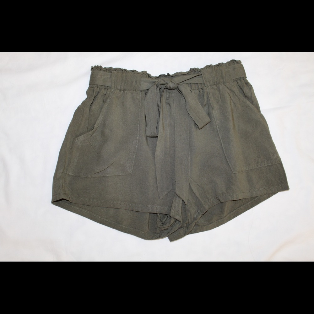 Olive green shorts.